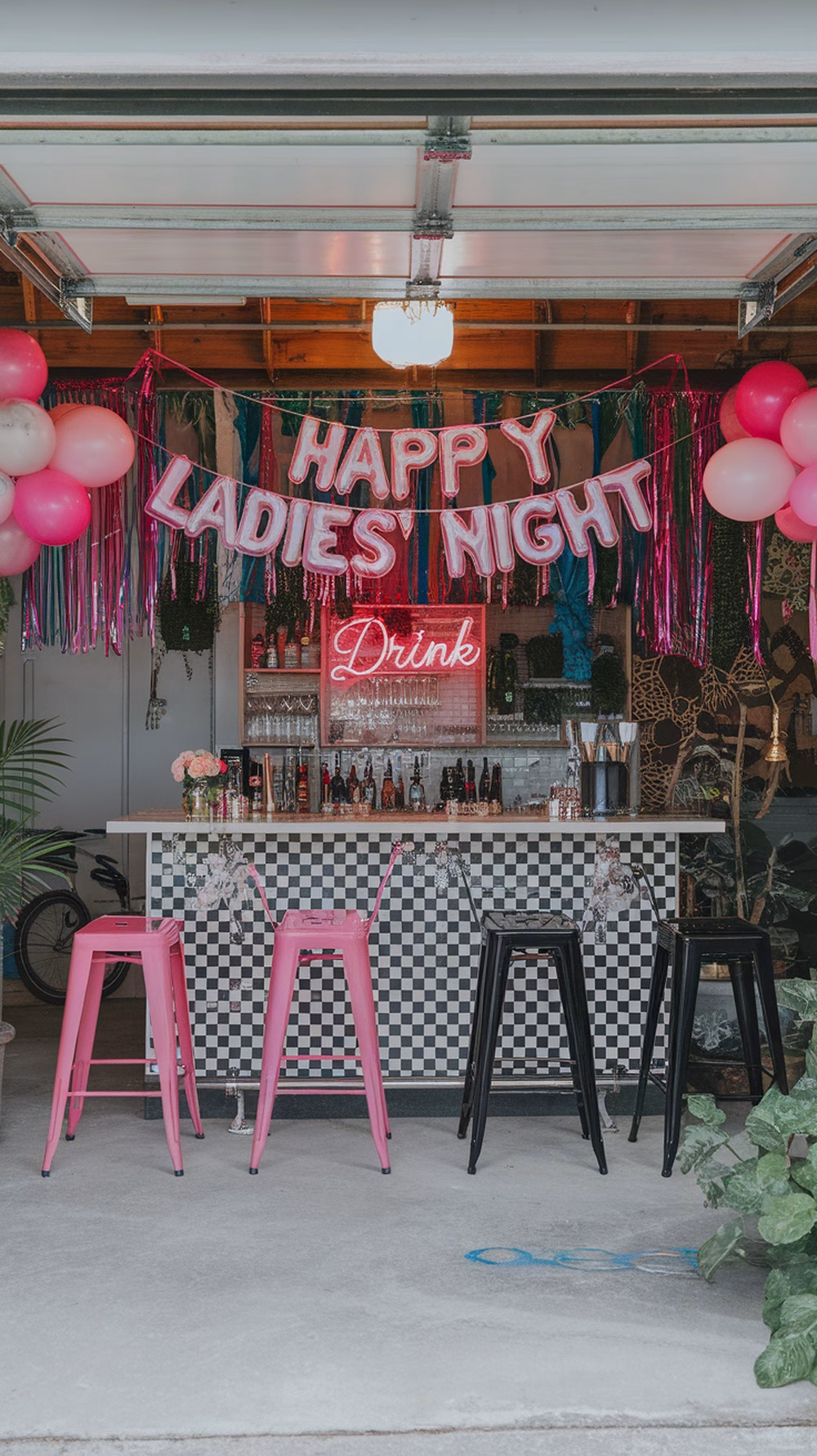 A garage bar decorated for a ladies' night with a colorful theme and a cheerful sign.